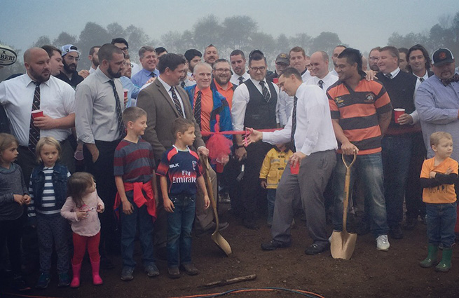 Kalamazoo Dogs rugby pitch commercial loan ribbon cutting