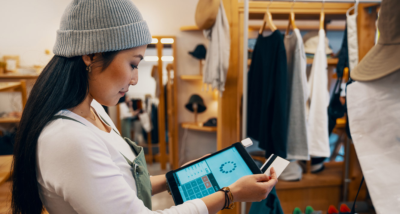 Shop owner processing credit card transaction