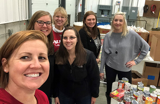 New hires volunteering at Kalamazoo Loaves and Fishes