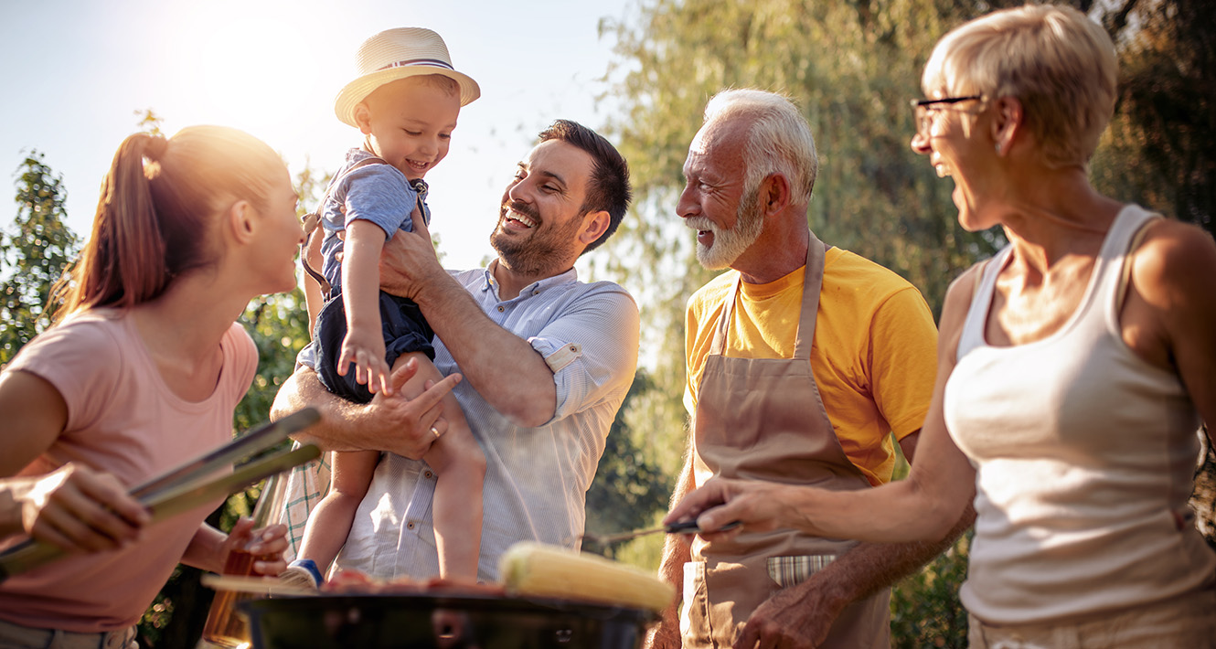 Family outside at barbecue