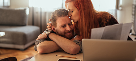 Happy couple with Boost Savings account